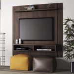 Decoração de sala pequena com painel de tv 26