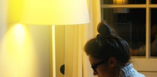 woman-wearing-warm-woolen-sweater-is-reading-book